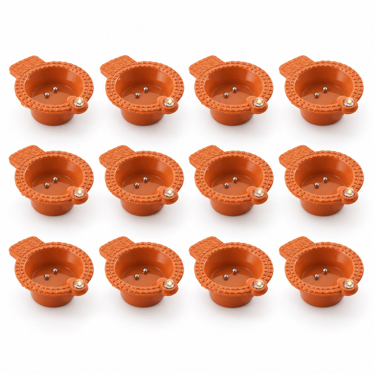 Water sensor flameless LED diyas in a festive arrangement on a table