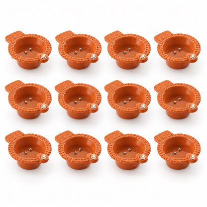 Water sensor flameless LED diyas in a festive arrangement on a table