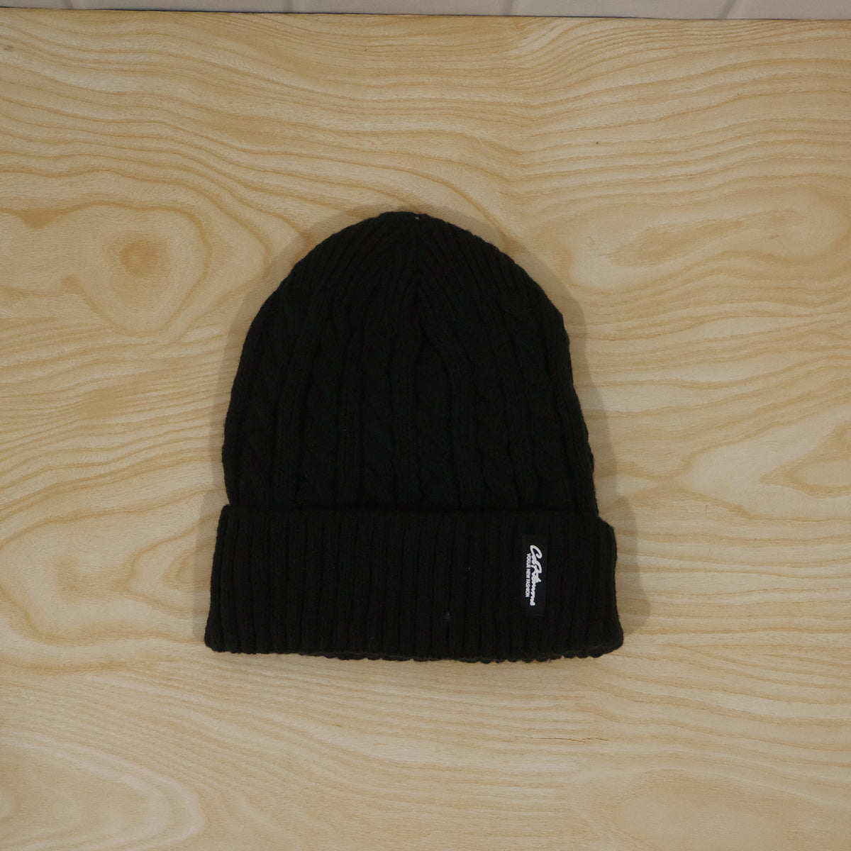 Cable knit winter beanie cap with fleece lining, actual product photo
