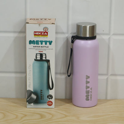 A light purple Metty water bottle with a silver cap and black strap stands next to its product box on a white tiled surface.