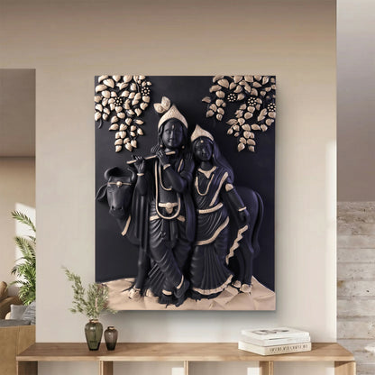 Black and gold Radha Krishna wall art hanging on wall