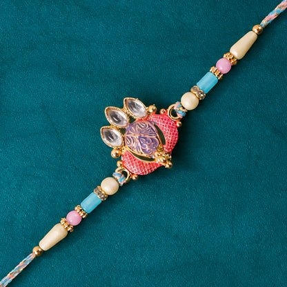 Coral Enamel Medallion Pendant Rakhi with Kundan Teardrop Stones
