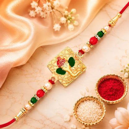 Buy Golden Ganpati Rakhi Red Green Beads Enamel Detailing