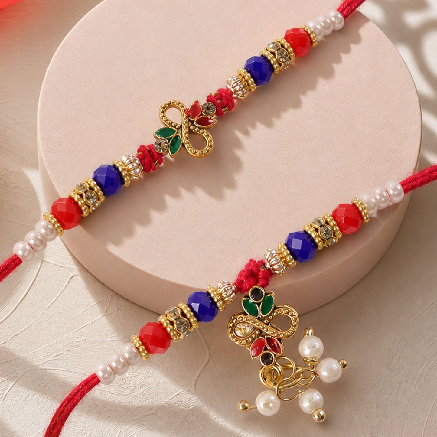 Divine Leaf Feather Motif Design Bhai Bhabhi Rakhi with Leaf Charm and Beads for Gift