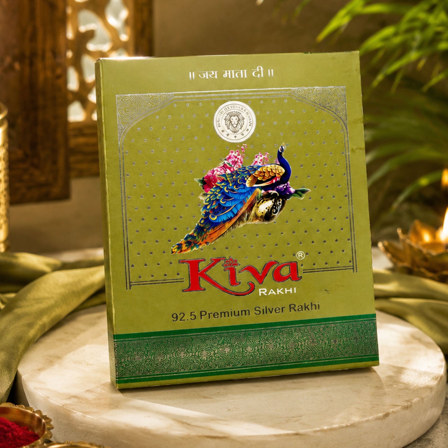 Silver Rakhi with Golden Square Om Centre, Roli Chawal Coin and Peacock Gift Packing