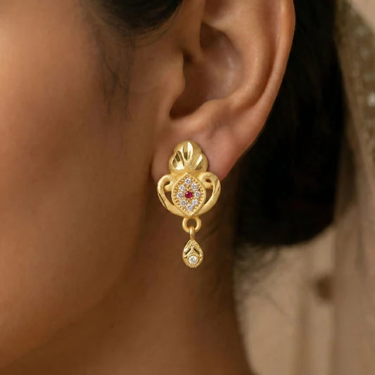 Ethnic Floral Motif Gold Stud Earrings With Stone Center And Elegant Drop Finish