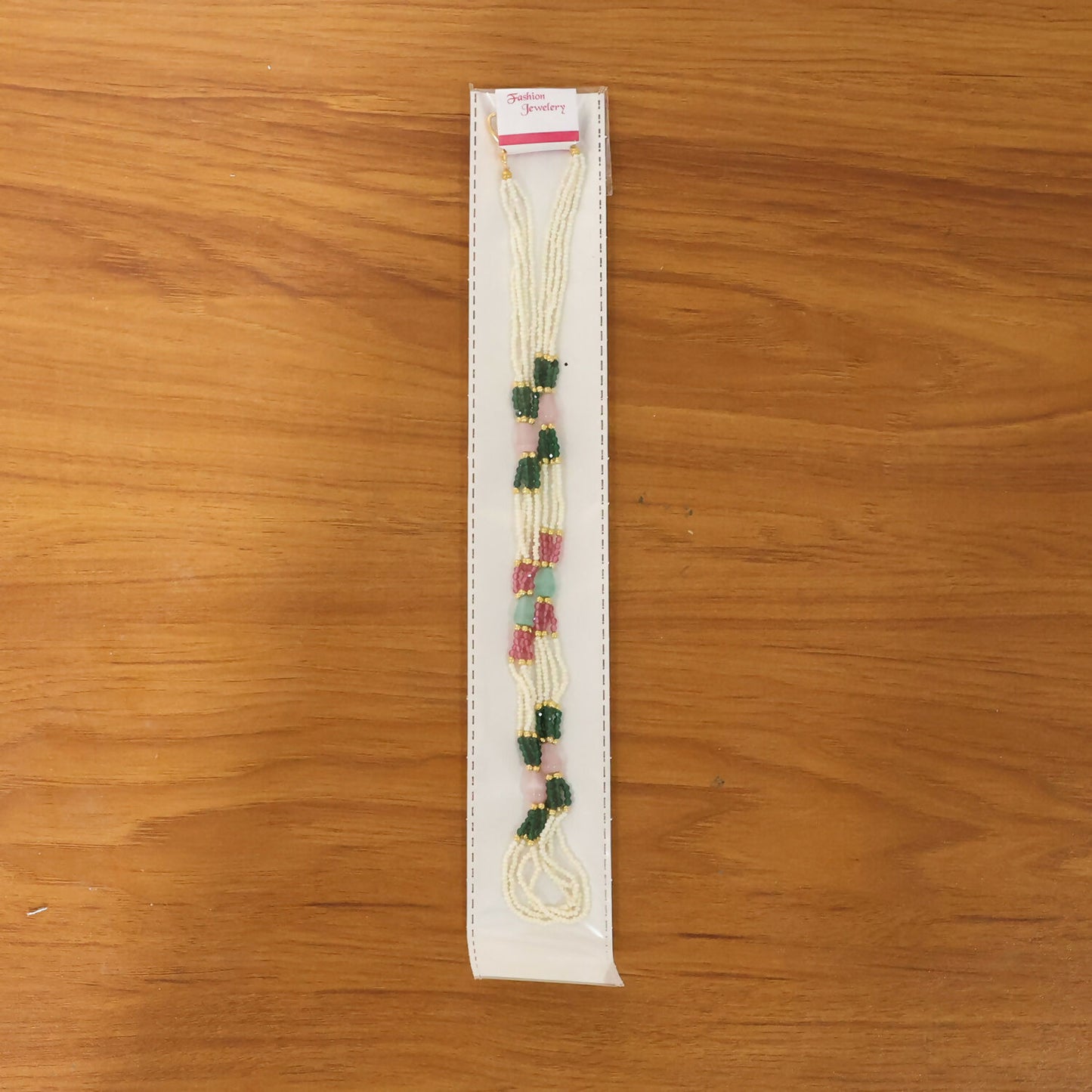 Multi-layered ethnic pearl necklace with colorful accents