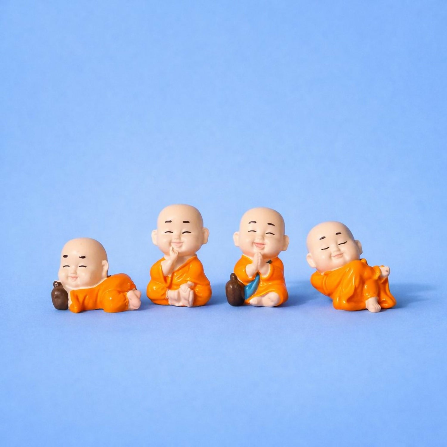 Smiling Monk Showpiece Set of 8 | Mini Buddha Figurines for Home Decor