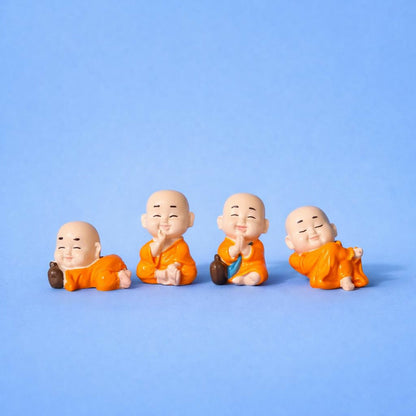Smiling Monk Showpiece Set of 8 | Mini Buddha Figurines for Home Decor