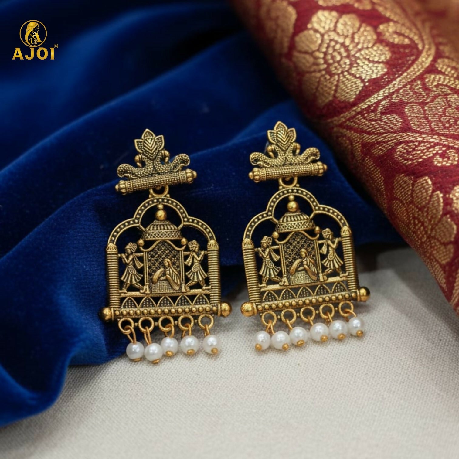 Side view of Royal Doli Motif temple earrings showing pearl danglers