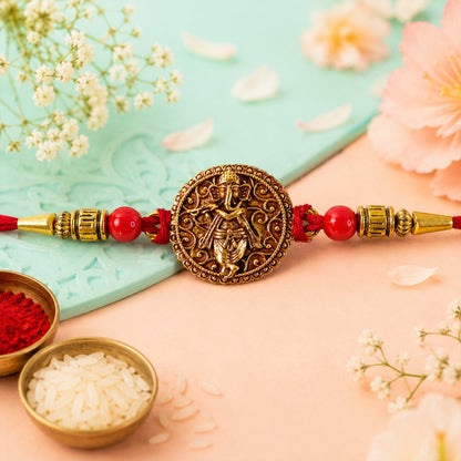Ganesha Coin Rakhi Antique Design with Vibrant Red Beads (10pcs)
