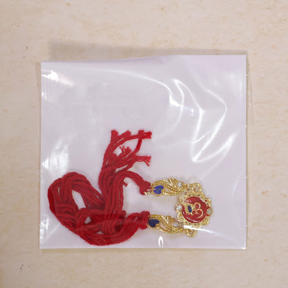 Premium Rakhi featuring Om Plaque, gold trims and chain look for Festive Display