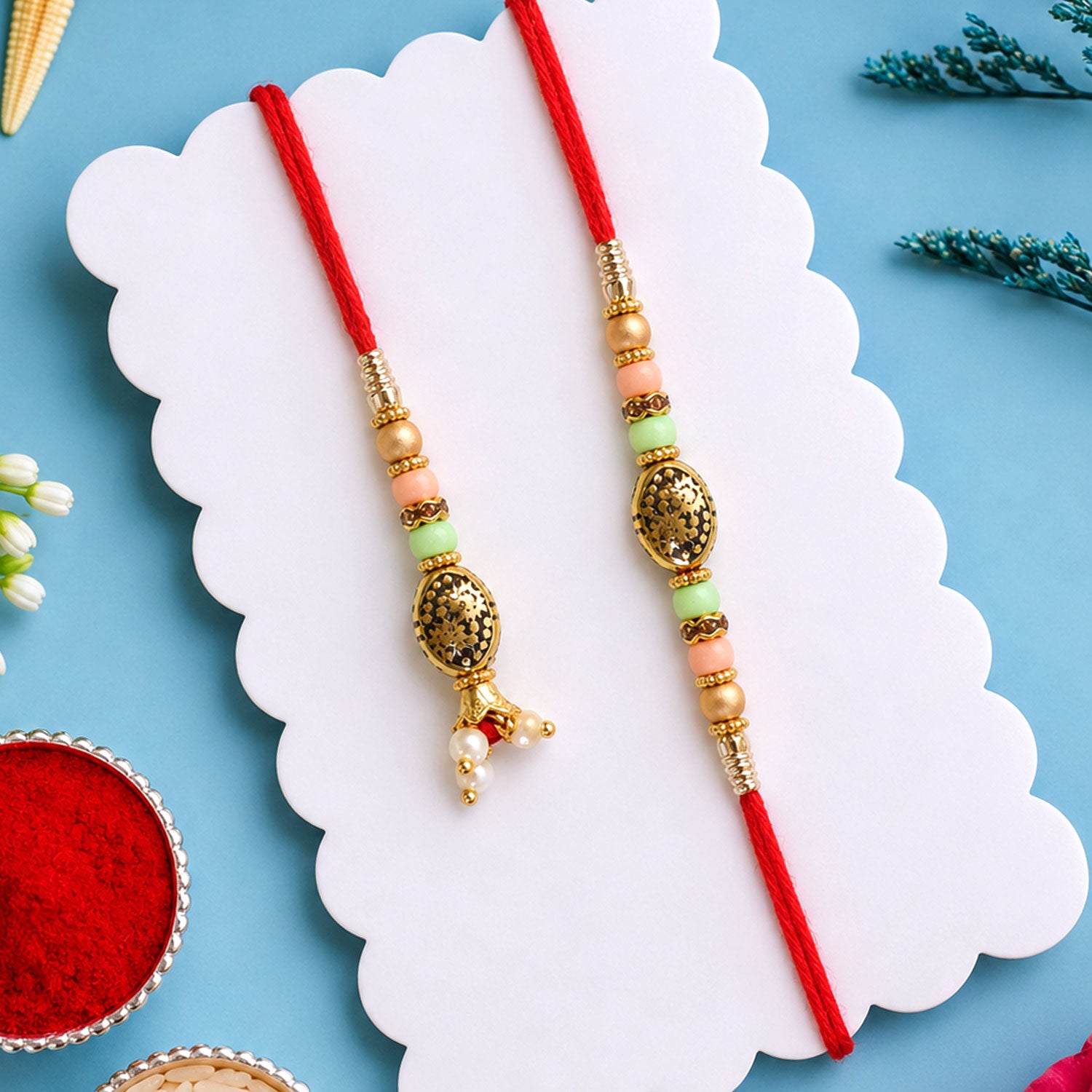 Divine Circular Medallion Bhai Bhabhi Rakhi with Oval Charm and Bead Accents for Gift