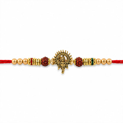 Ganesh Ji Antique Golden Devotional Rakhi with Red Beads and Pearl-Style Accents