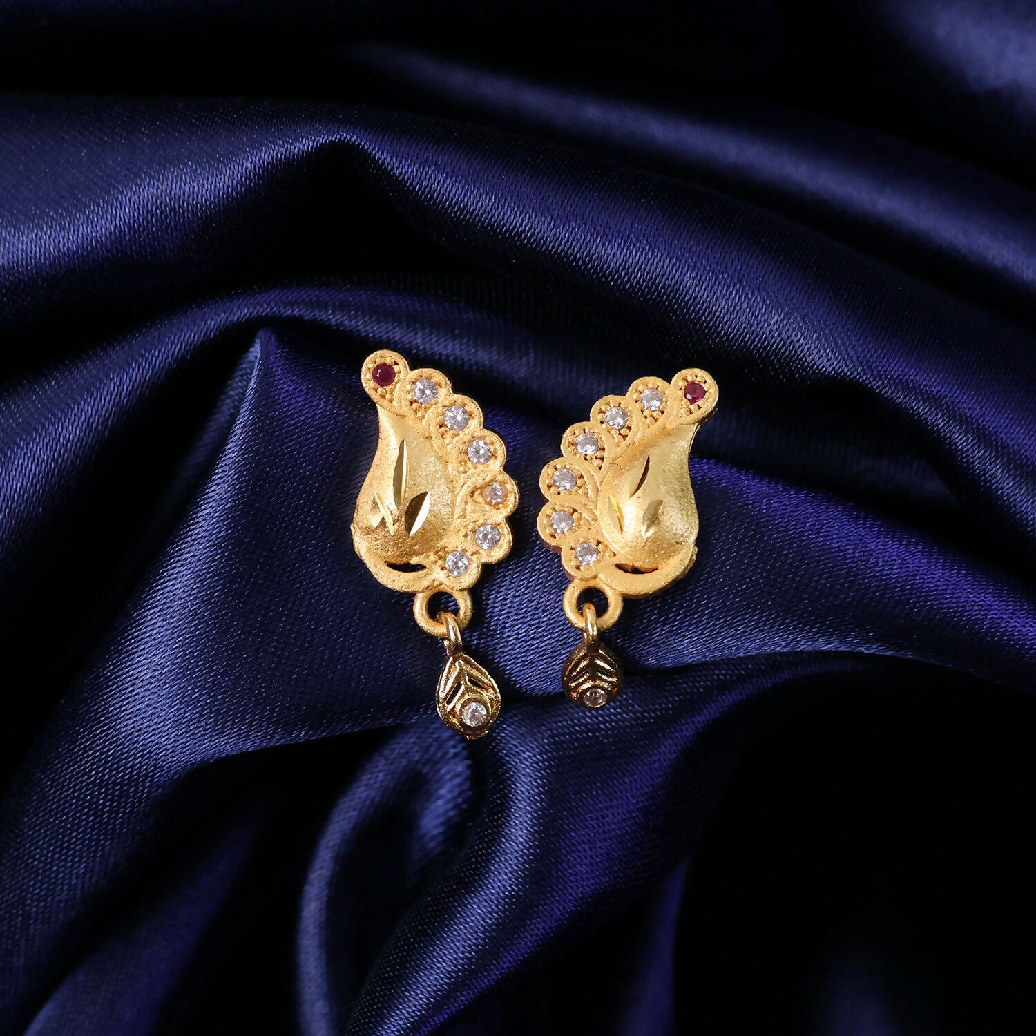 Peacock Inspired Gold Finish Earrings With Textured Motif And Stone Drop Accent