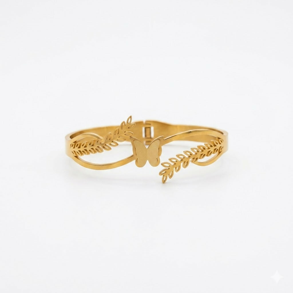 Side view of gold-tone floral kada bracelet