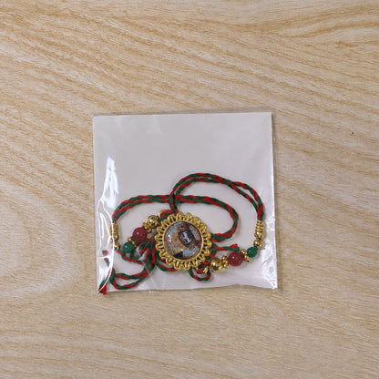 Khatu Shyam Ji Pendant Rakhi with Red and Green Beads