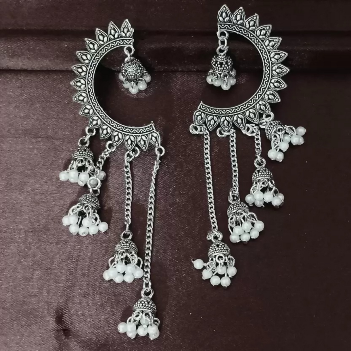 Oxidized Crescent Chandbali Earrings Featuring Long Jhumka Chains and Classic White Pearl Embellishments