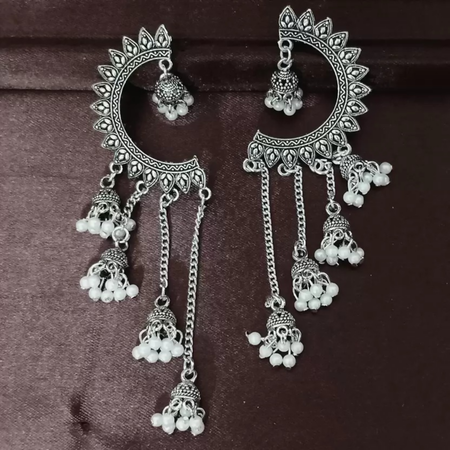 Oxidized Crescent Chandbali Earrings Featuring Long Jhumka Chains and Classic White Pearl Embellishments