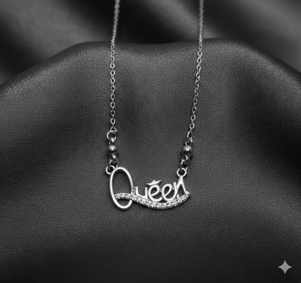 Silver tone Queen pendant necklace with sparkling Cubic Zirconia stones on fine chain