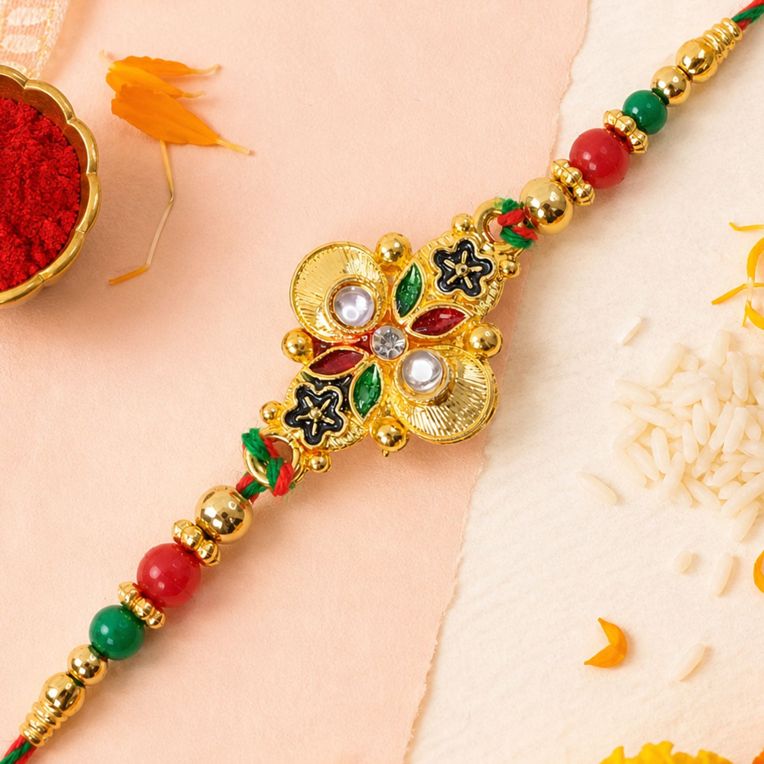 Multicolor Floral Kundan Pendant Rakhi with Red and Green Beads