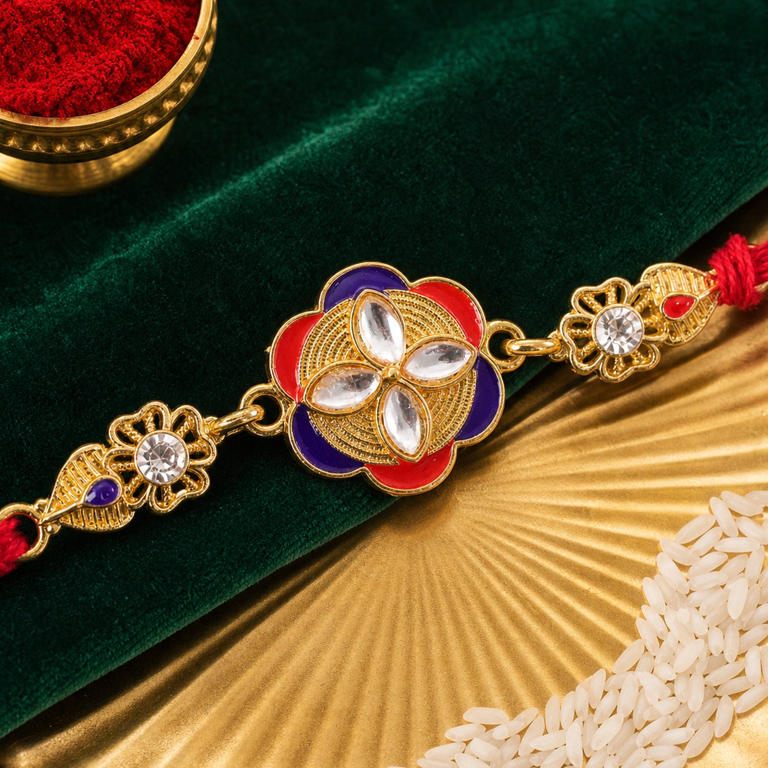 Festive Rakhi showcasing Decorative Rosette, pearl accents and bead line for Gifting