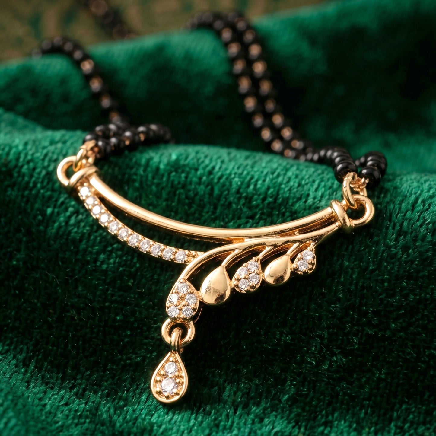 Contemporary rose gold mangalsutra design with wave arc pendant and black bead chain