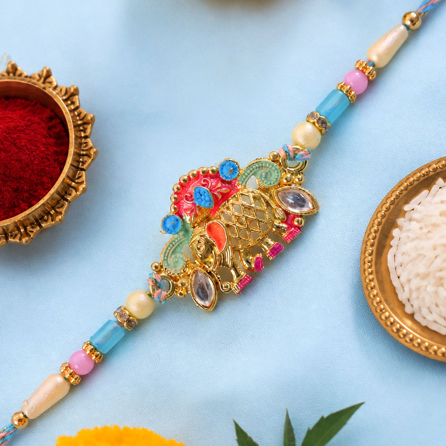 Textured Gold Elephant Pendant Rakhi with Multicolor Kundan
