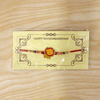 Top-down view of the Kids Rakhi, showcasing its full design and colorful beaded thread.