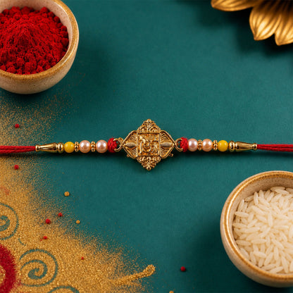 Lord Ganesha Antique Gold Tone Rakhi with traditional design