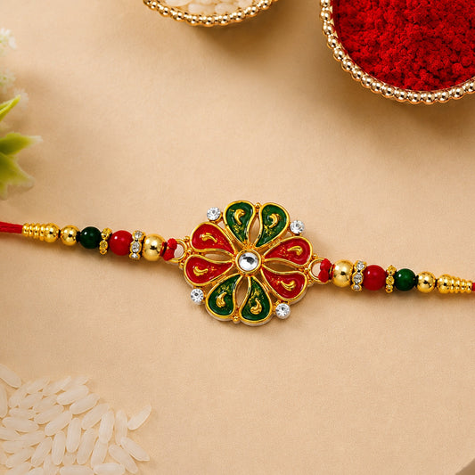 A vibrant Flower Rakhi for Brother, featuring colorful enamel petals and shining golden beads.
