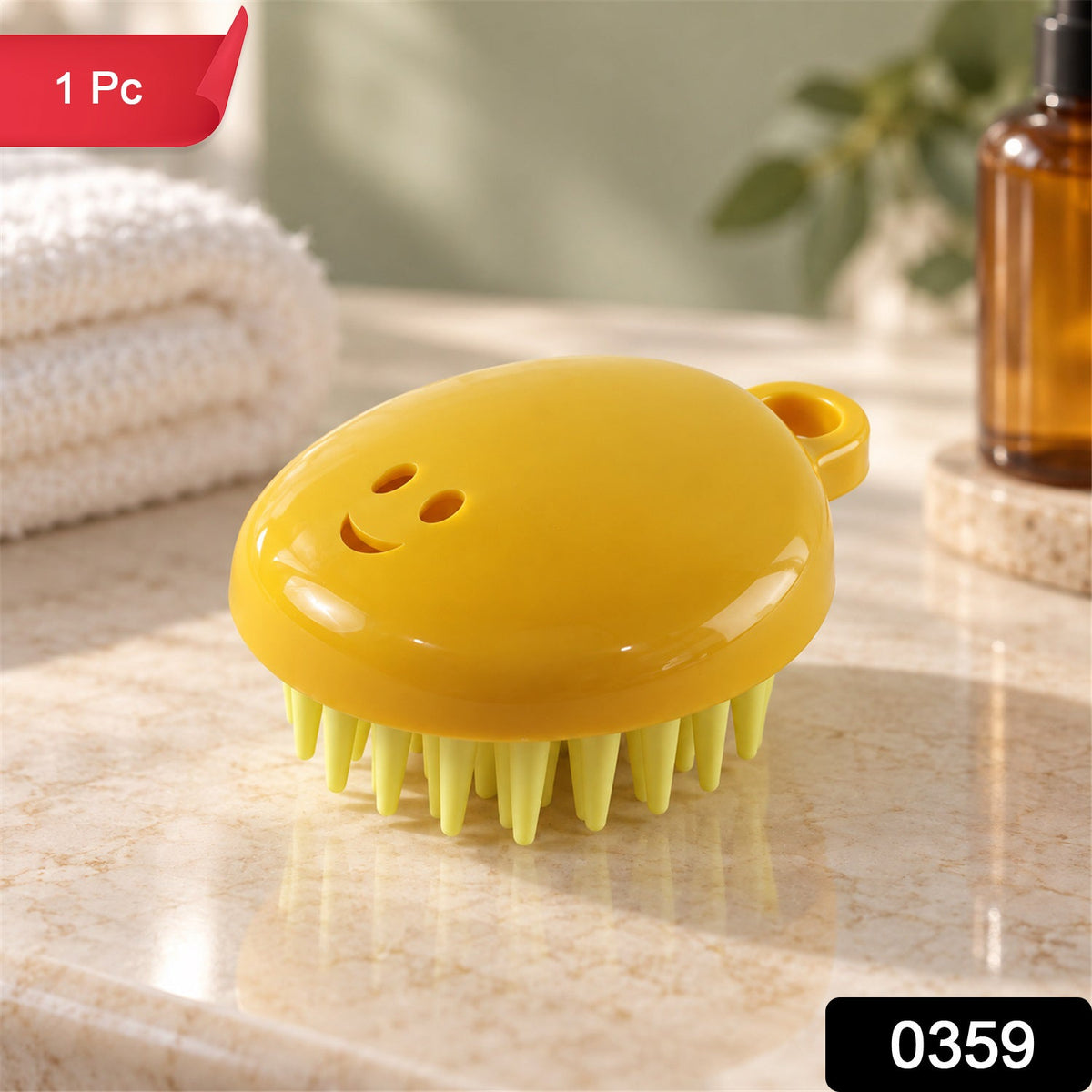 A yellow silicone scalp brush with light green bristles and a smiley face design rests on a marble countertop.