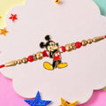 Floral Stone Beaded Rakhi with Pearl Accent and Round Center Design