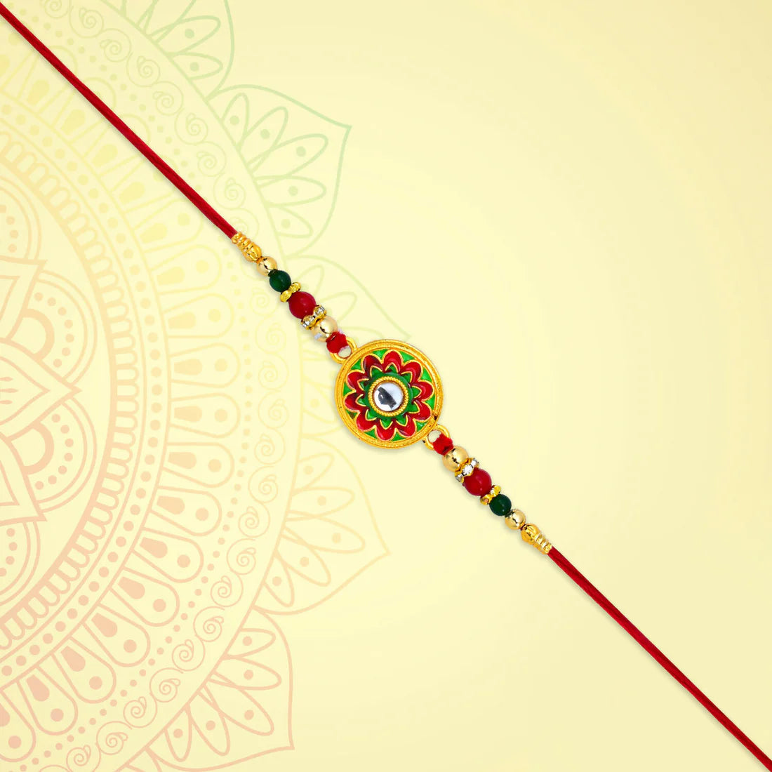 Side view of the Kundan Rakhi showing the intricate beadwork and thread.