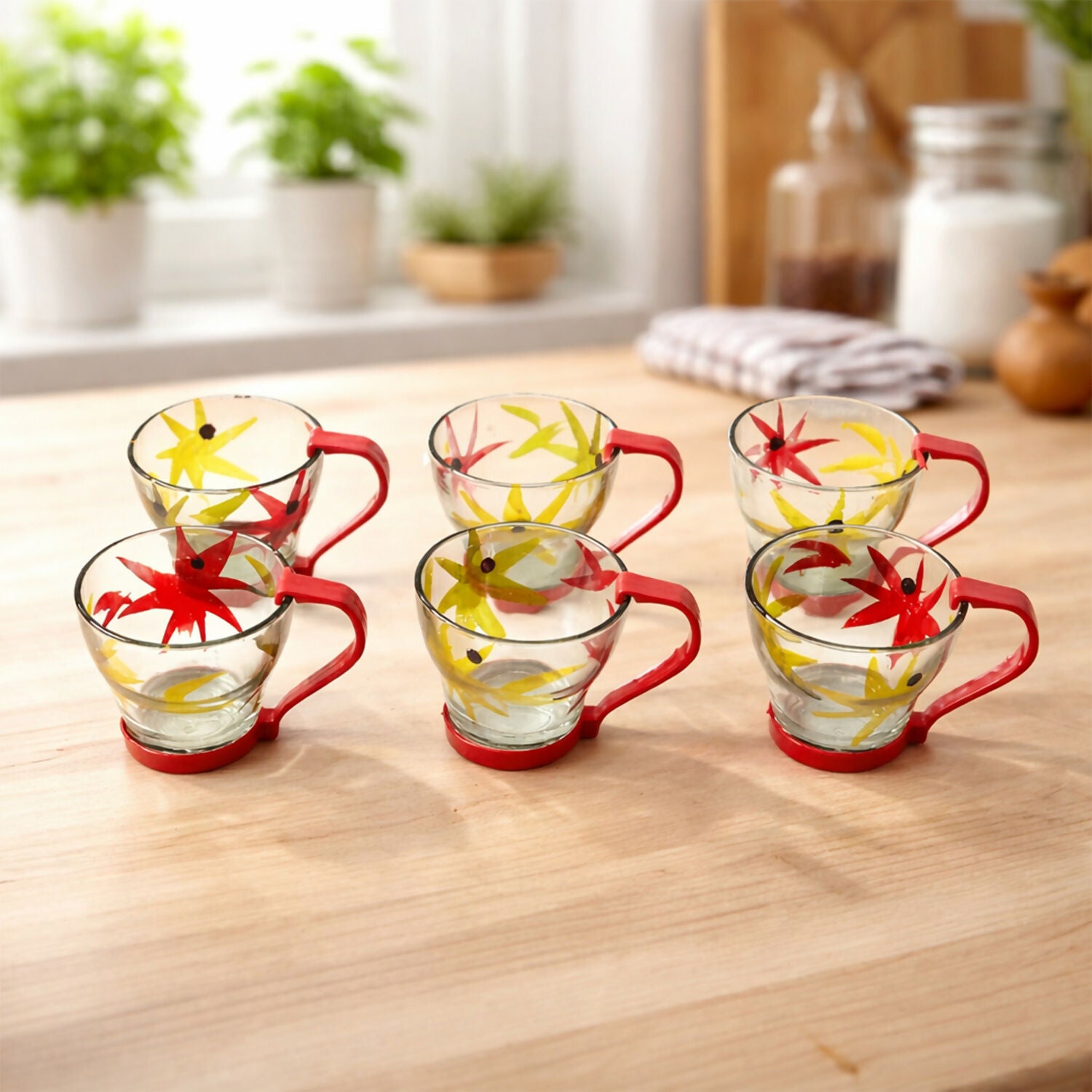 Glass tea cups with handles and floral print