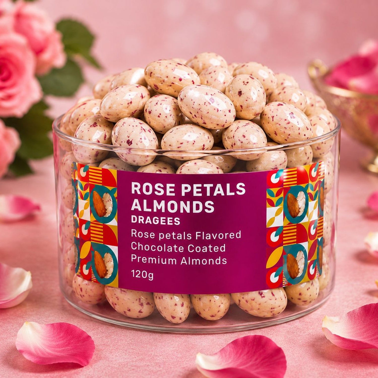 Delicious chocolate-coated badam dragees spilling from their elegant jar.