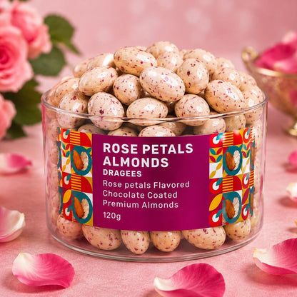Delicious chocolate-coated badam dragees spilling from their elegant jar.