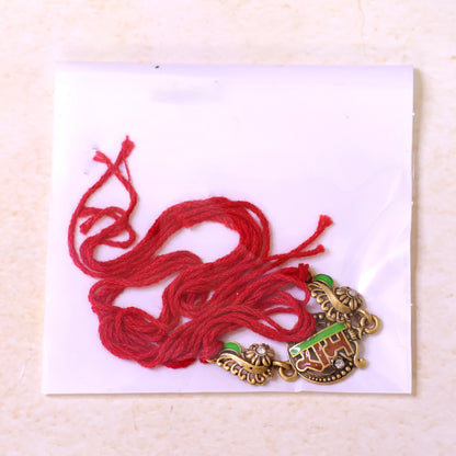 Antique Gold-Toned Ram Rakhi with Crystal Accents, Green Enamel & Designer Red Thread