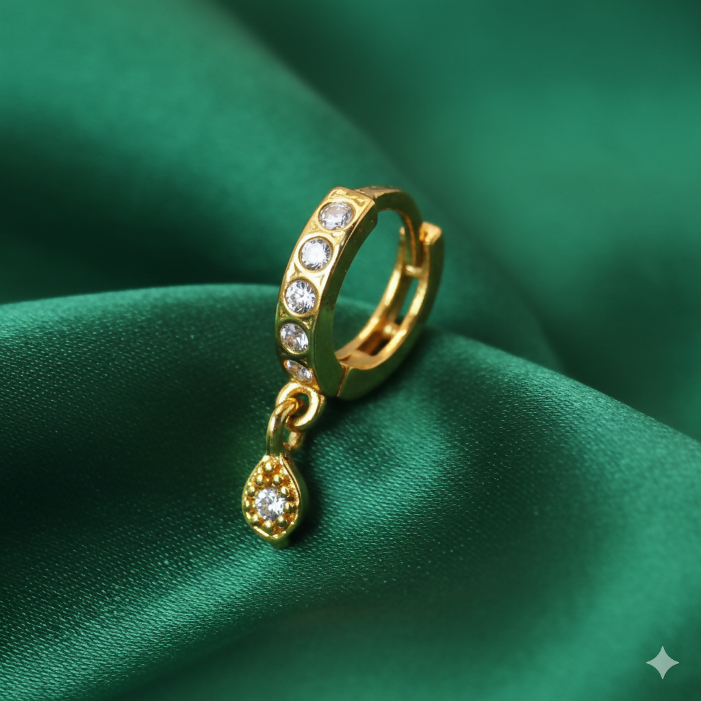 Gold plated huggie teardrop earrings front view showcasing sparkling cubic zirconia stones