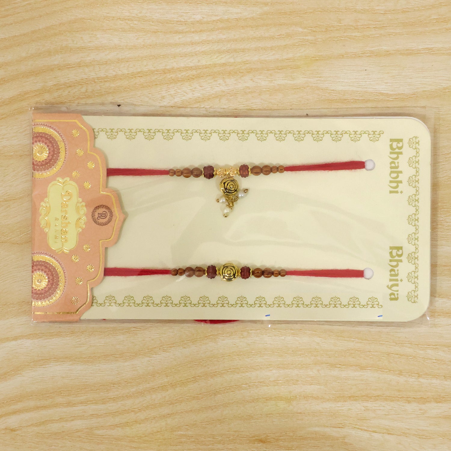 Floral Rose Design Bhai Bhabhi Rakhi with Spiral Rose and Pearl Tassel for Gifting