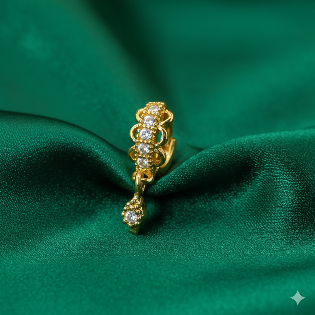 Gold plated ethnic floral nosepin ring featuring CZ stones in a vertical bridge design