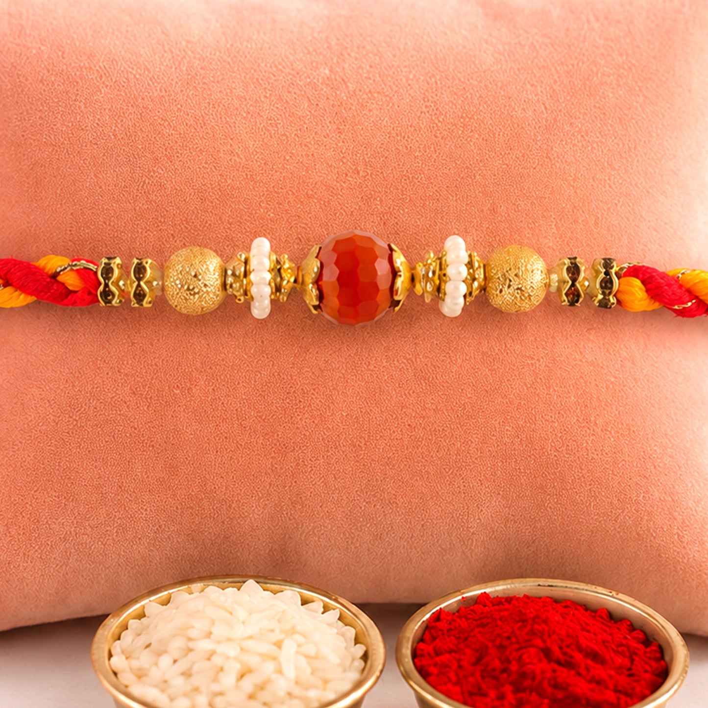 Beautiful Pearl Bead Rakhi with Soft Festive Shades and Elegant Designer Look