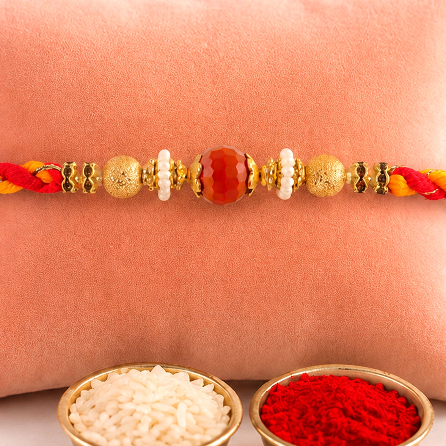 Beautiful Pearl Bead Rakhi with Soft Festive Shades and Elegant Designer Look
