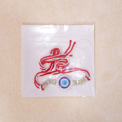 Premium Rakhi showcasing Evil Eye Charm, leaf touch and thread look for Gift Use