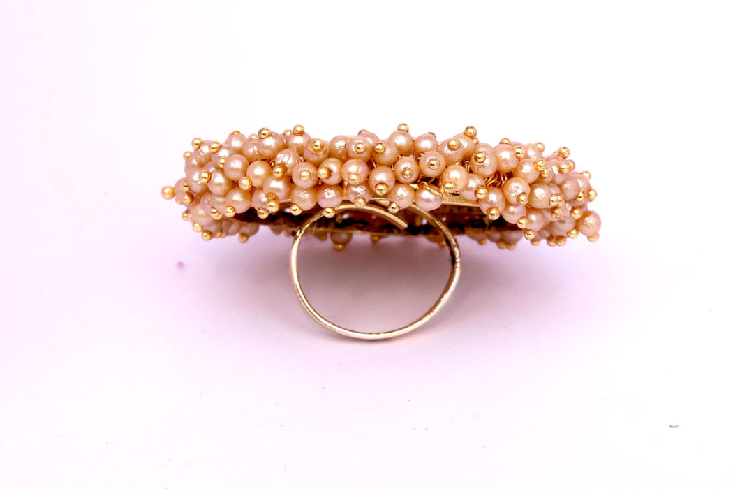 Guchha Alloy Garnet Gold Plated Ring – Elegant and Bold