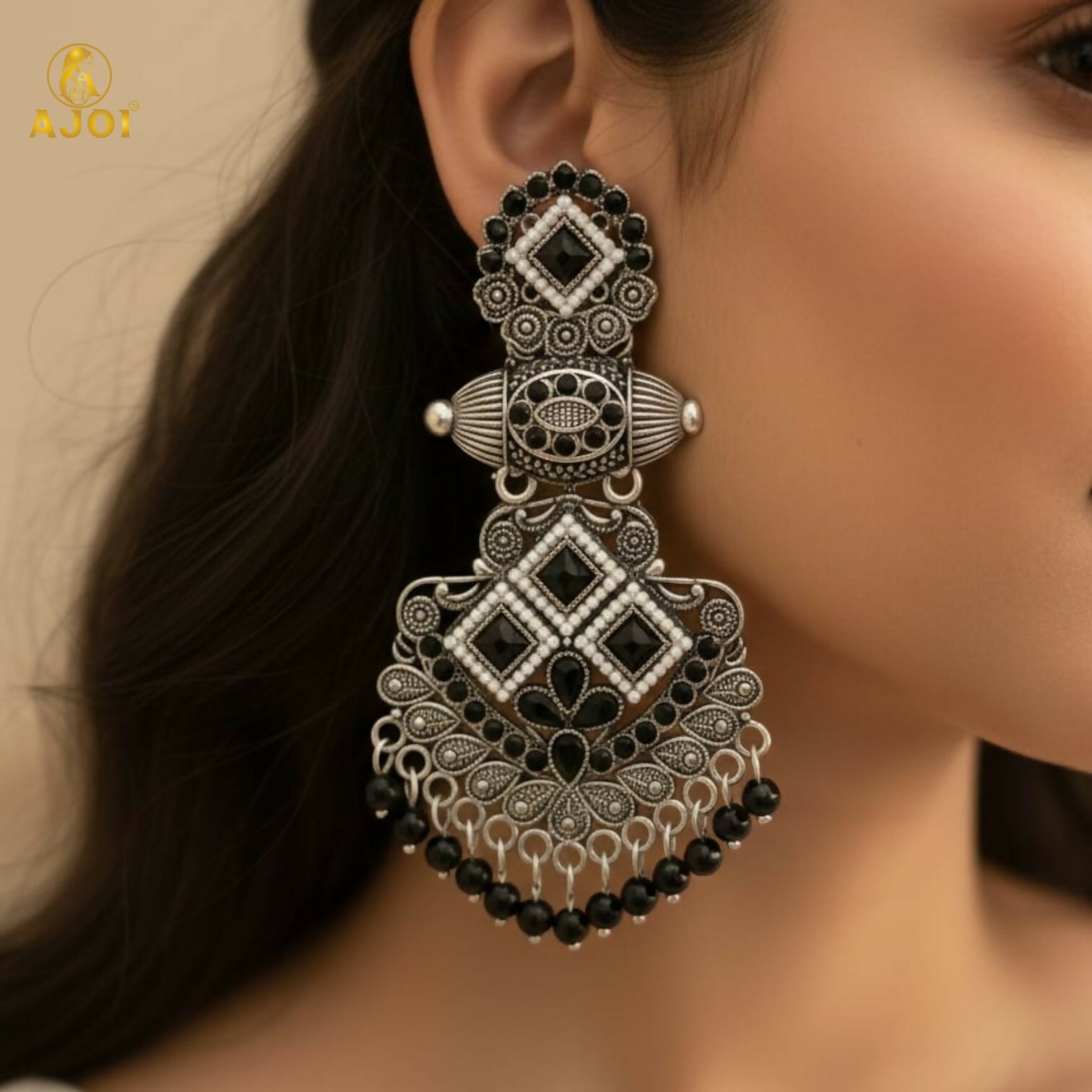 Intricate antique detailing on oxidized silver chandbali earrings