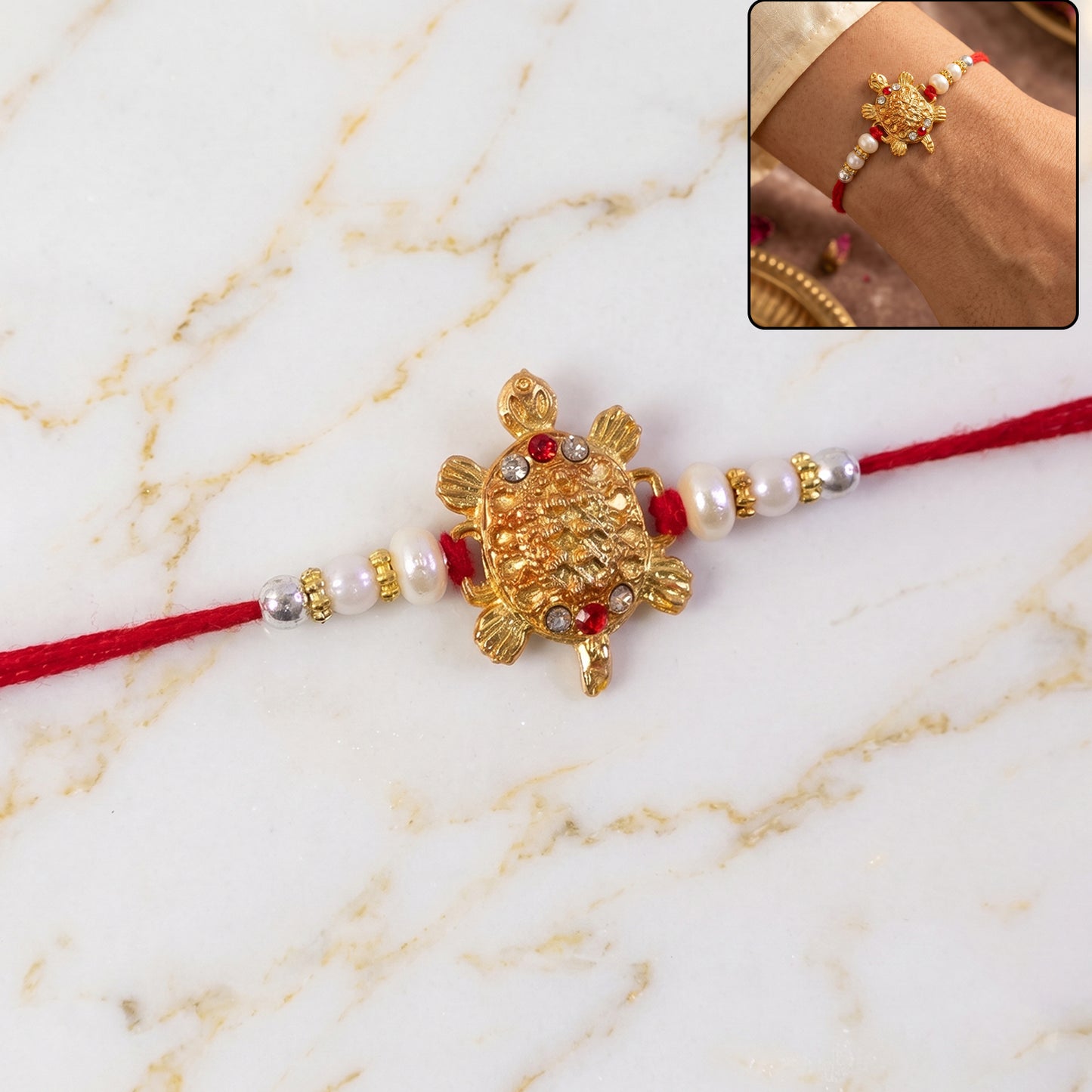 Gold Turtle Charm Rakhi with Pearl Sides and Red Mauli Thread