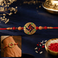 Rakhi – Elegant multicolor Swastik design with peach beads for Rakshabandhan