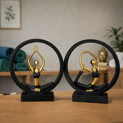 Yoga meditation figurine showpiece in black and gold on desk