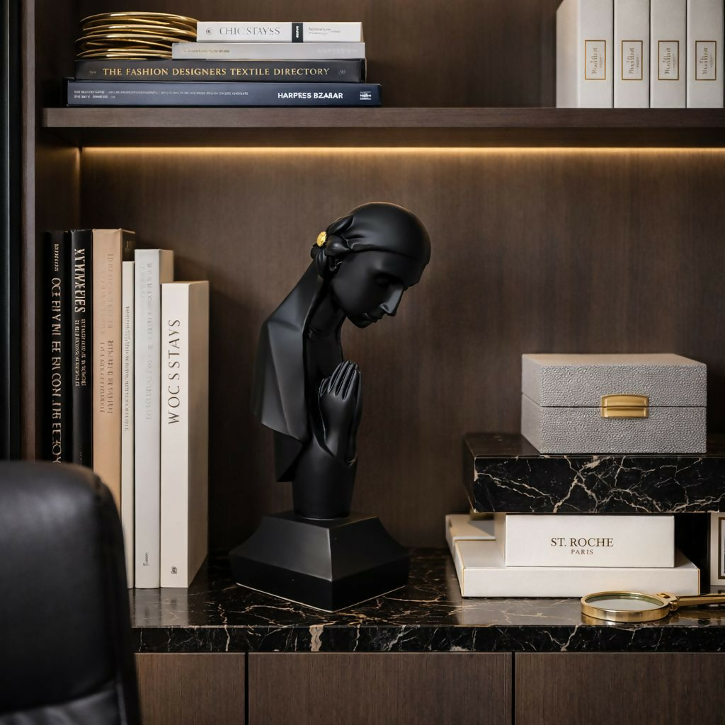 Side view of praying lady decorative sculpture with minimalist design